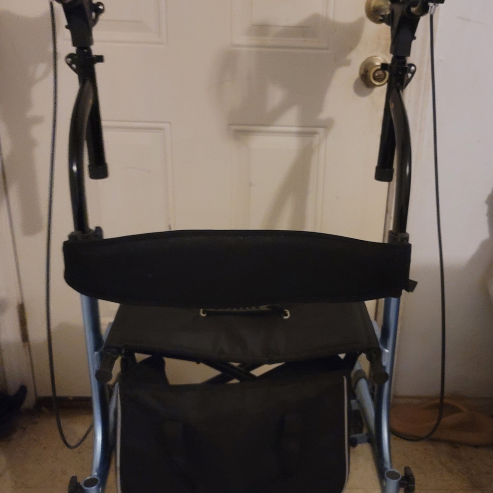 Black and Silver Storage Walker with Integrated Seat